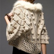 Knitted cape with fur collar